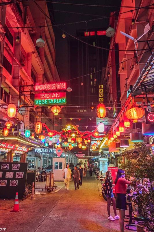 Train Night Market Ratchada Bangkok with vintage train containers and colorful night atmosphere