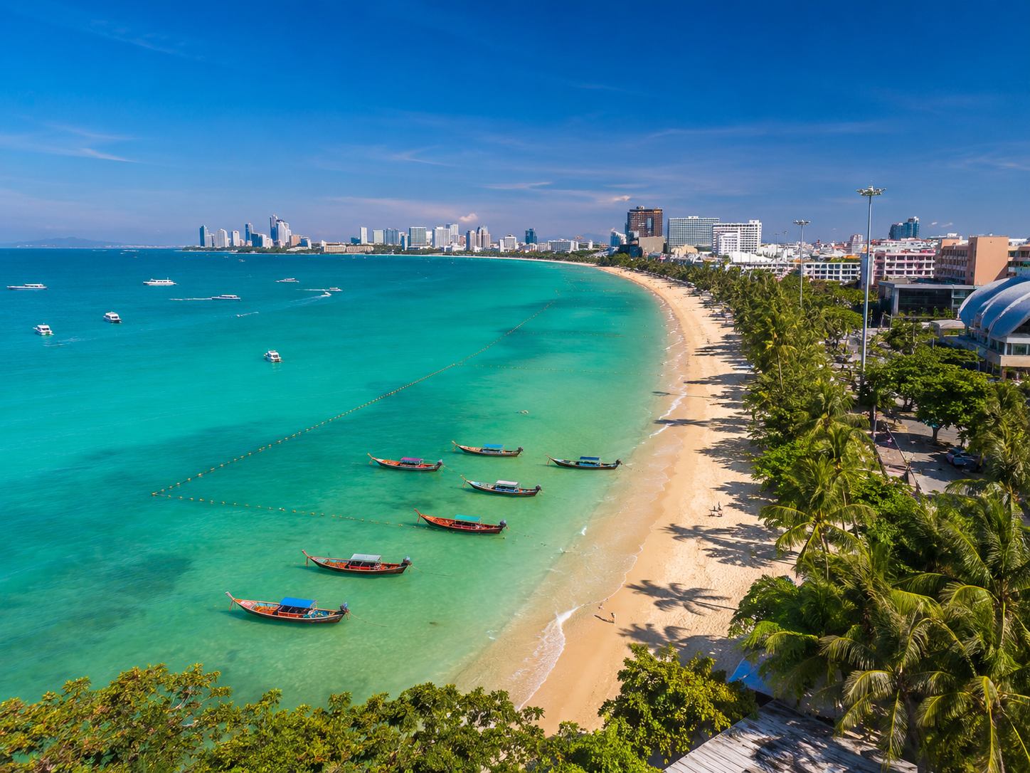 Panoramic view of Pattaya Bay from Pratumnak Hill viewpoint, Thailand, on a clear sunny day