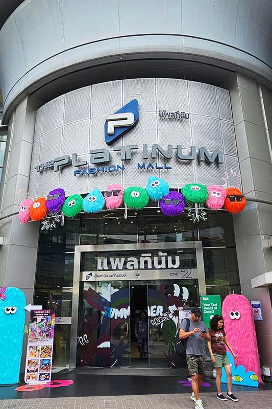 Pratunam Market Bangkok interior showing wholesale fashion stalls and bulk buying atmosphere